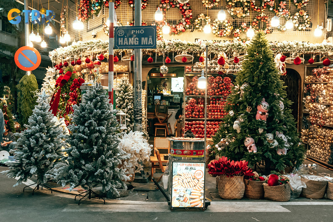 Hang Ma Street bursts with color as shops overflow with Christmas decorations