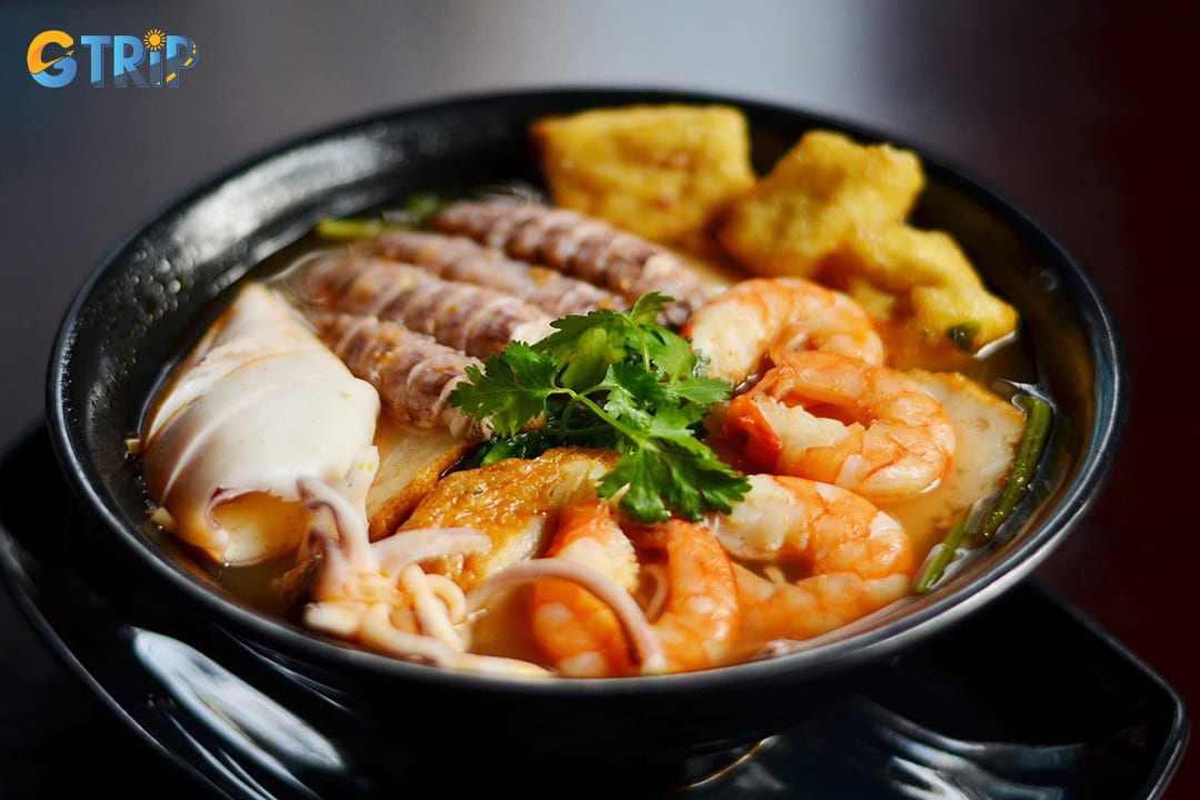 Hanoi seafood noodles showcase the bounty of Vietnam's coastline and freshwater resources in a luxurious soup