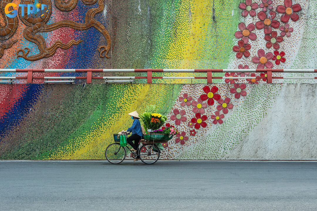 Hanoi's Ceramic Mosaic Mural, the world’s longest, stretches nearly 4km along the Red River, showcasing vibrant ceramic art celebrating Vietnamese culture and history