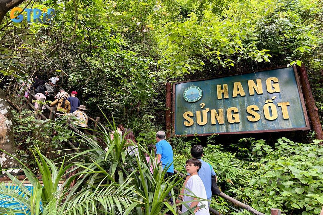 The hike to Sung Sot Cave features a scenic path leading to a stunning cave with illuminated stalactites and stalagmites