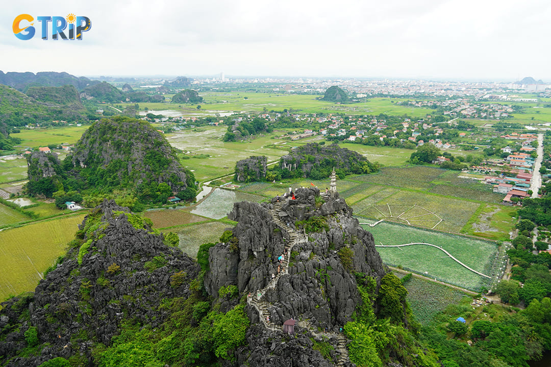 Hiking to the top of Mua Cave to enjoy the panoramic views of Ninh Binh