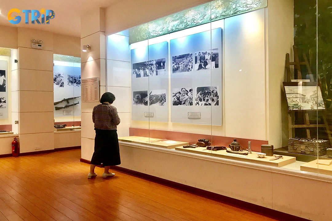 Historical photographs capturing pivotal moments in Vietnamese public security history line the walls