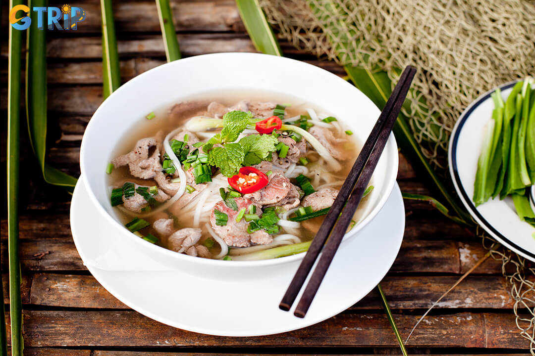 Ho Chi Minh City is the heart of southern-style pho, known for its sweeter broth, bold flavors, and generous piles of fresh herbs