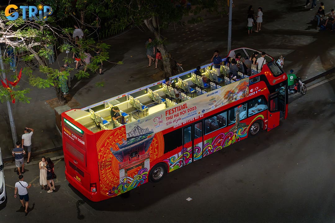 Hop-on Hop-off bus tour in Hanoi offering panoramic views, multilingual audio guides, and easy access to over 20 major attractions