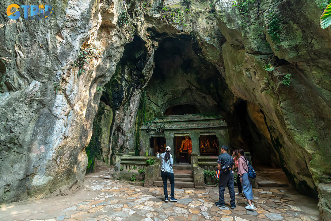 Huyen Khong Cave showcases a stunning harmony of art and nature, with sacred Buddha statues carved directly into the living rock of the cavern