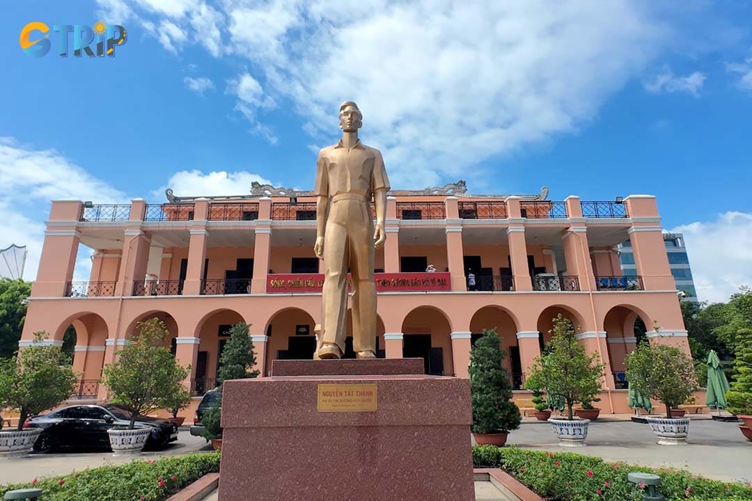 In the courtyard facing the Saigon River stands a striking bronze statue of the young Nguyen Tat Thanh