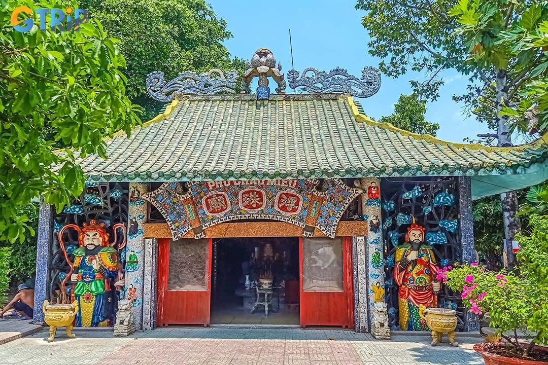 Inside Phu Chau Floating Temple, fragrant incense, gilded altars, and intricate wood carvings create a serene, sacred atmosphere that invites quiet reflection