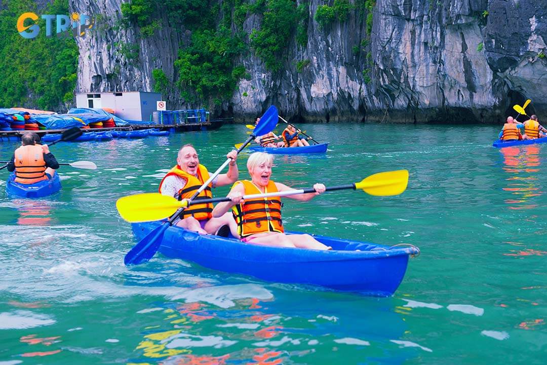 Tourists look so excited when trying to kayak in Minh Chau Beach