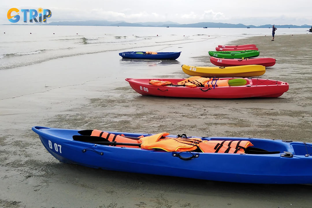 Kayaking at Van Chay Beach offers a chance to explore its clear, tranquil waters while enjoying the beautiful coastline