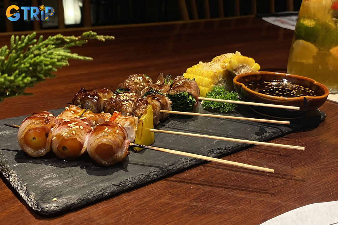 Kyo Watami offers authentic Japanese cuisine in a serene, minimalist setting, featuring sushi, sashimi, udon, and set menus for a refined dining experience