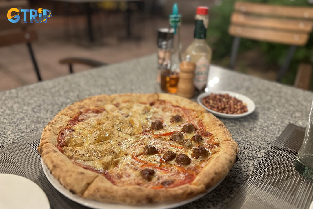 La Bodega Restaurant offers a unique pizza experience that blends Spanish influences with Italian traditions