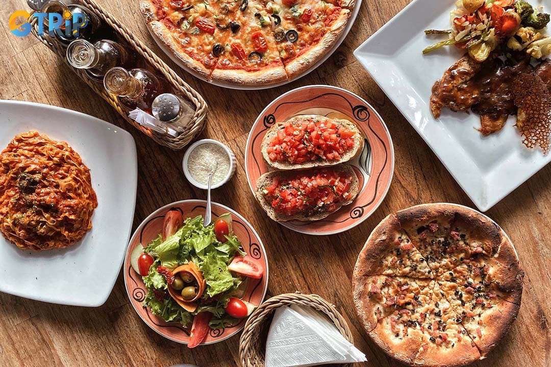 Luna Pub is a lively Italian-style pub known for wood-fired pizza, homemade pasta, craft beers, and live music performances