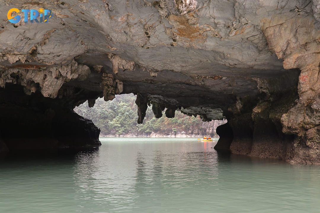 Luon Cave is known for its serene lagoon, but swimming is not recommended due to safety concerns