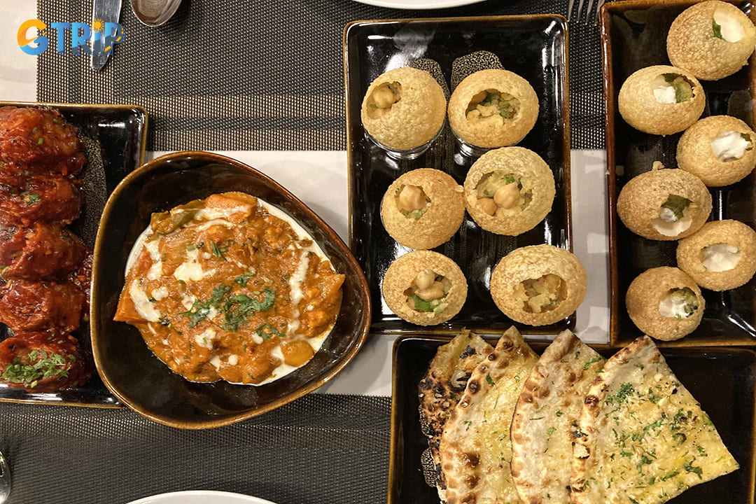 MAAZI Old Quarter offers a sophisticated blend of traditional Indian flavors with contemporary twists