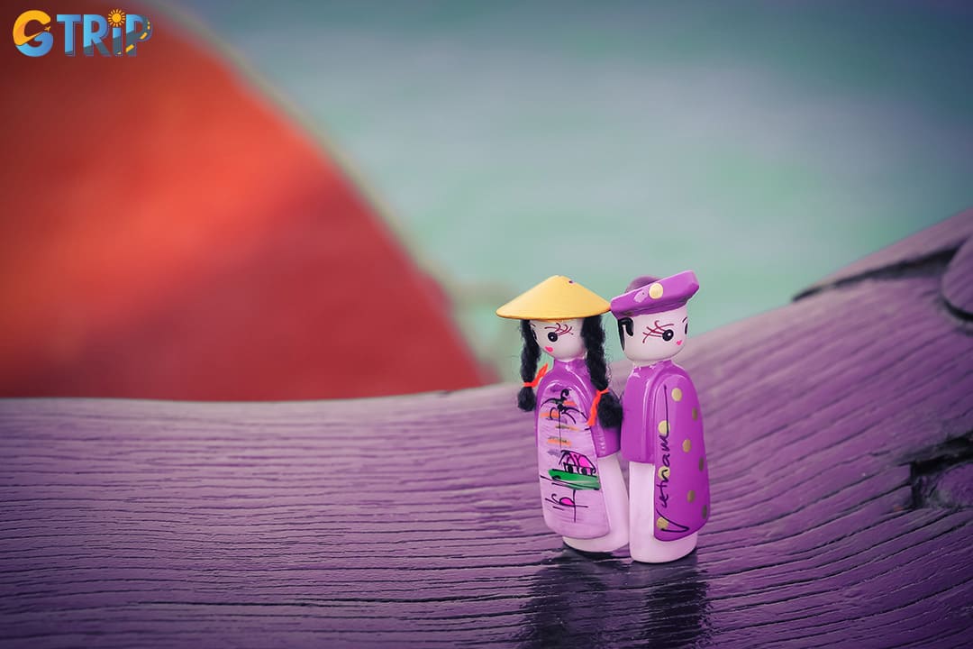 Magnet dolls offer a charming, compact way to bring home a slice of Vietnamese culture, featuring hand-painted figures in traditional attire