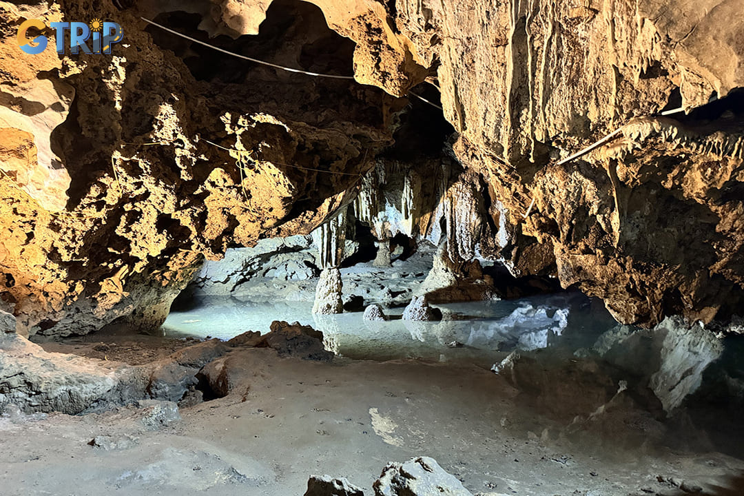 Meditating near the small lake inside the cave encourages mindfulness