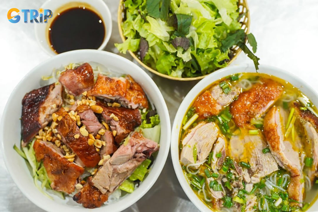 Mi or bun vit quay combines the richness of roasted duck with either egg noodles (mi) or rice vermicelli (bun)
