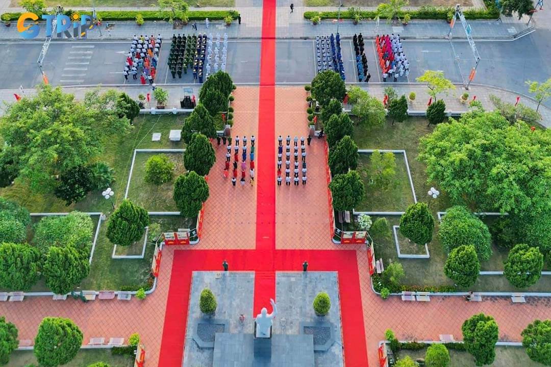 Many people are attending the flag-raising ceremony at the Monument of Uncle Ho