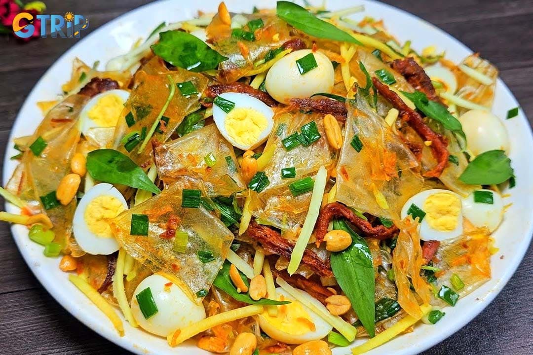 Nguyen Thuong Hien Street is the ultimate hotspot for Vietnamese snacks, famous for its endless Banh Trang Tron vendors and refreshing tropical fruit juices