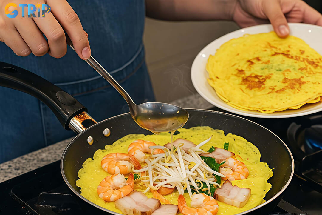 Northern-style Banh Xeo is simpler and moderately sized, featuring a savory batter without coconut milk and served cut into bite-sized pieces for easy sharing