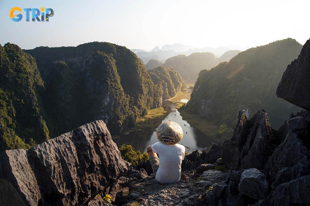 Pack moisture-wicking clothes, a hat, UV protection, and a waterproof pouch for outdoor activities in Ninh Binh