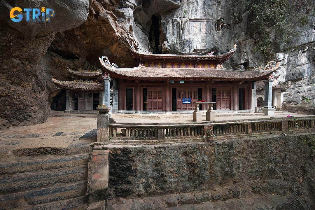 Ancient pagoda inside Bich Dong Cave