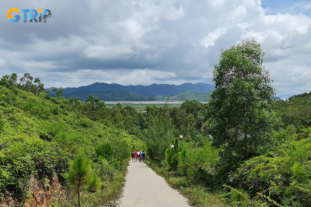 People hiking through the forest on the island