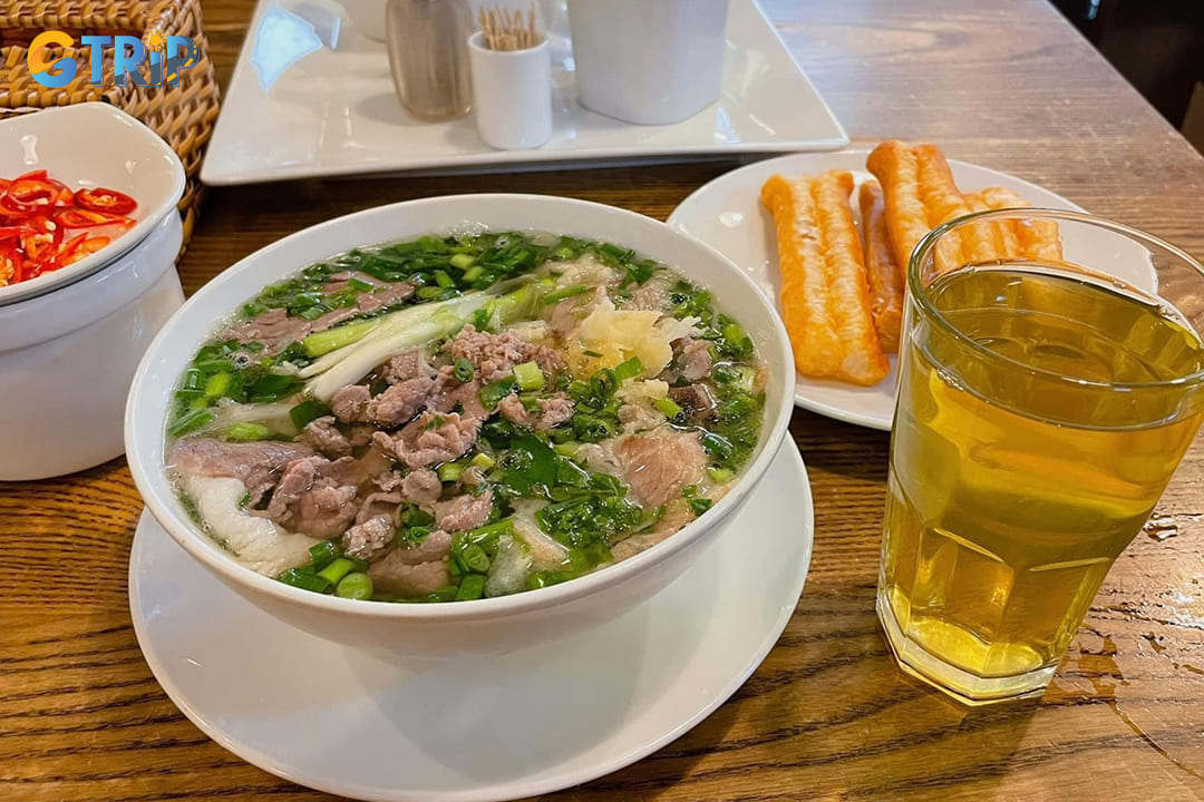 Pho Ly Quoc Su stands as one of Hanoi's most revered pho establishments, earning its iconic status through decades of culinary excellence