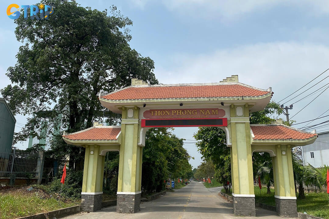 Phong Nam Ancient Village offering an authentic glimpse into traditional Vietnamese countryside life surrounded by rice fields and tranquil scenery