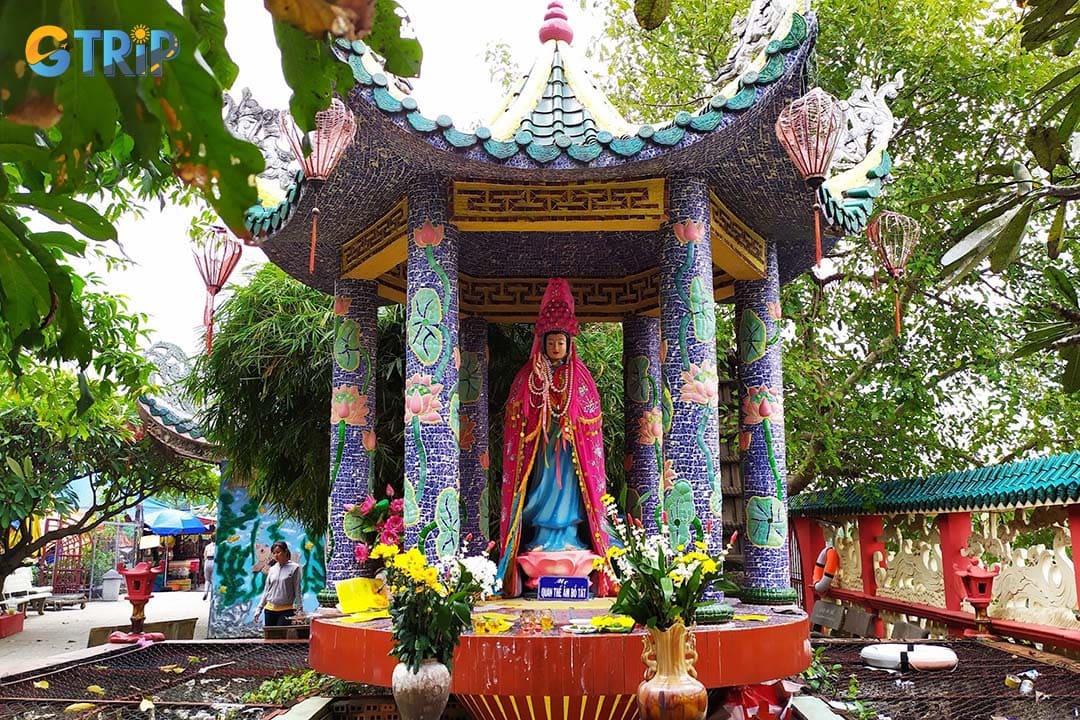 Phu Chau Floating Temple offers a truly unique spiritual escape, set on a small island in the Vam Thuat River and reached by boat