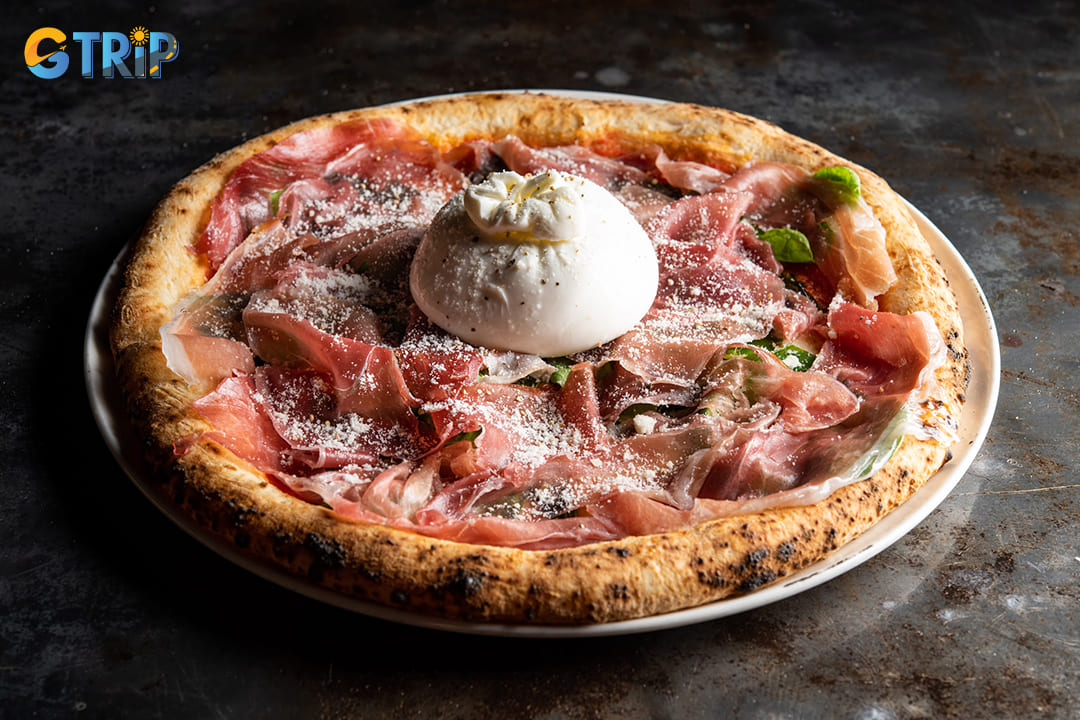 Pizza 4P's stands as a culinary landmark in Hanoi, offering a remarkable fusion of Vietnamese ingredients with traditional Italian pizza-making techniques