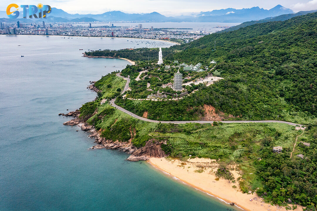 Plan with sun protection, cash, weather checks, respectful attire at nearby spiritual sites, and advance bookings during peak season to enjoy Bai But Beach at its best