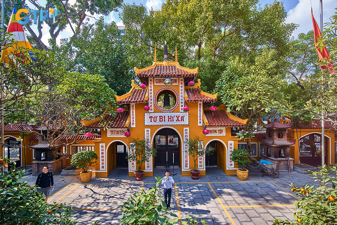 Quan Su Pagoda offers a serene spiritual retreat with traditional architecture, sacred statues, and tranquil gardens