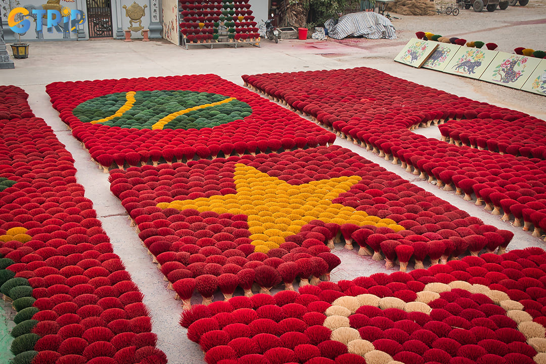 Discover the vivid beauty and 100-year-old craft of incense-making at Quang Phu Cau Village, where thousands of colorful incense sticks create iconic, photogenic scenes