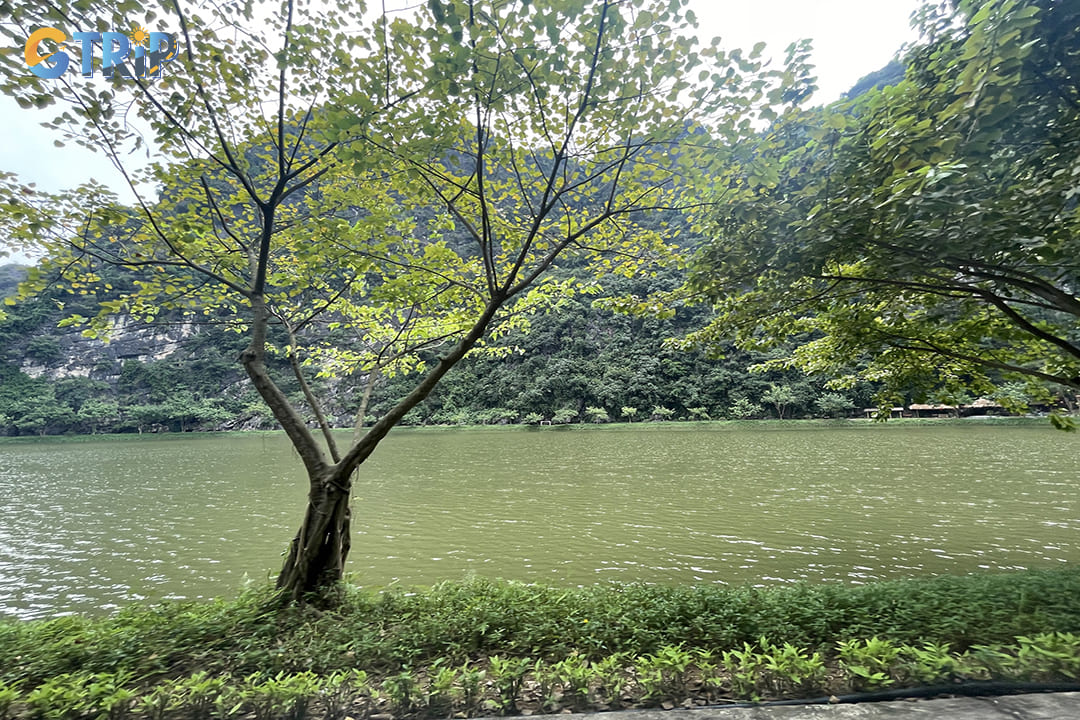 Lyrical landscape of the lake inside the cave and Am Tien mountain