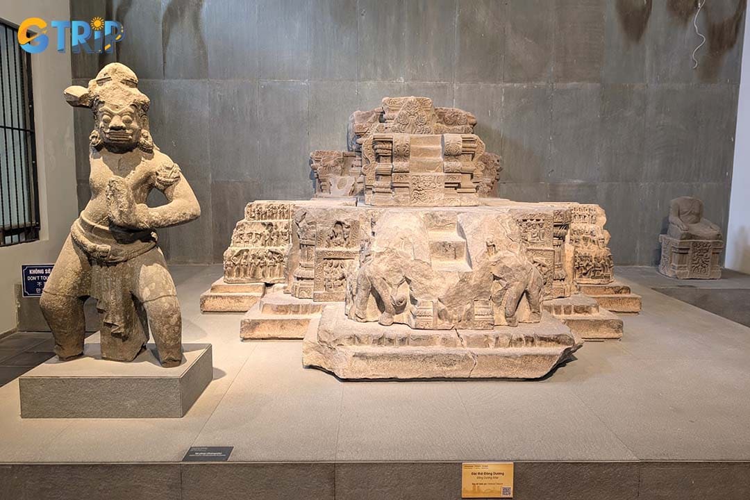 Read the bilingual information panels to understand how the sculptures reflect the Champa Kingdom’s spiritual world