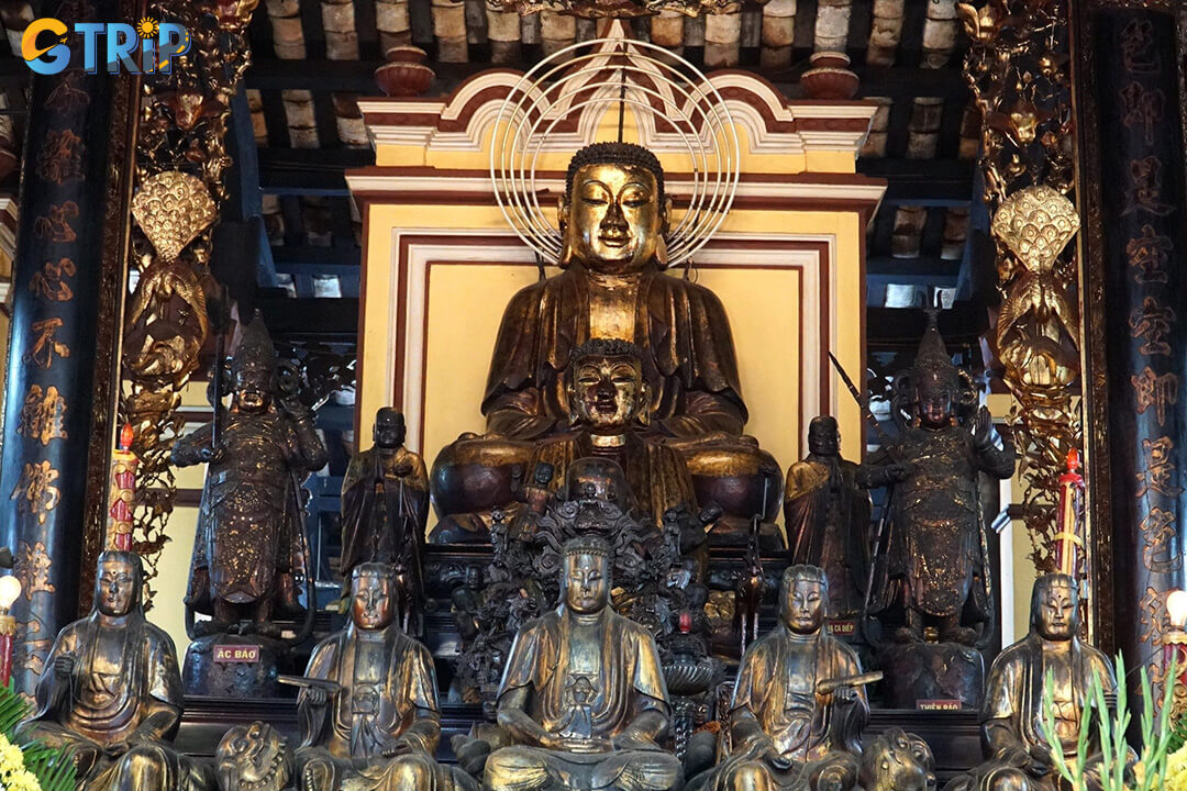 Respect local customs when visiting Giac Lam Pagoda dress modestly, keep quiet, avoid flash photography, and use donation boxes for contributions