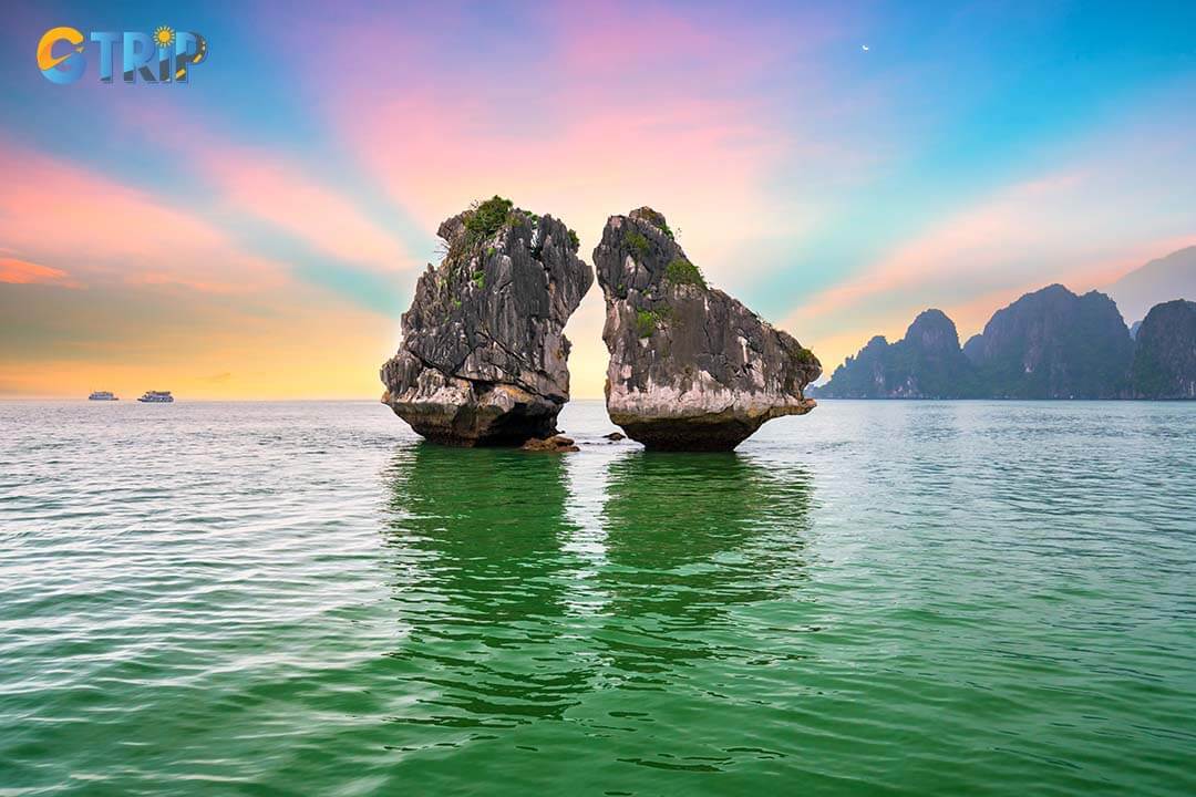 Dreamy sunset among the rocks of Halong Bay