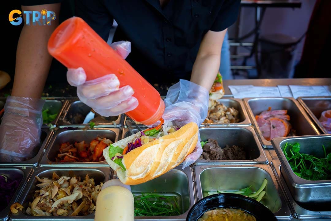Sauces and seasonings add depth, spice, and signature flavor, transforming a good Banh Mi into an unforgettable one