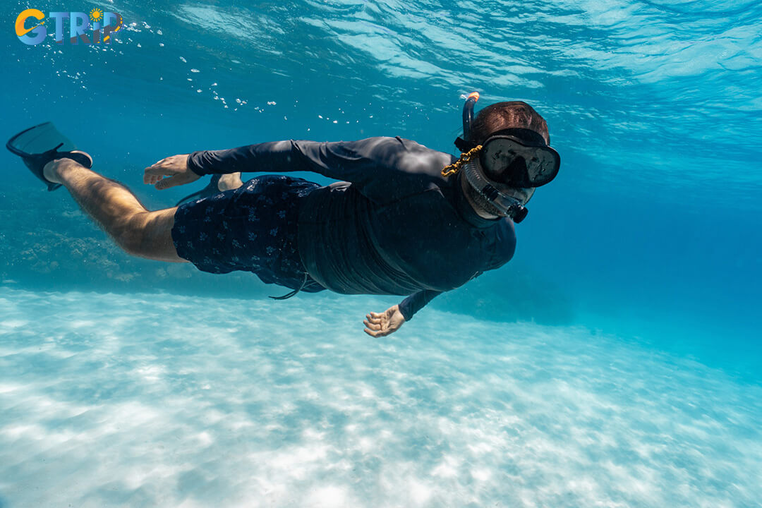 Snorkeling at Bai Ong offers a vibrant underwater experience with accessible gear, best enjoyed in the clear morning light