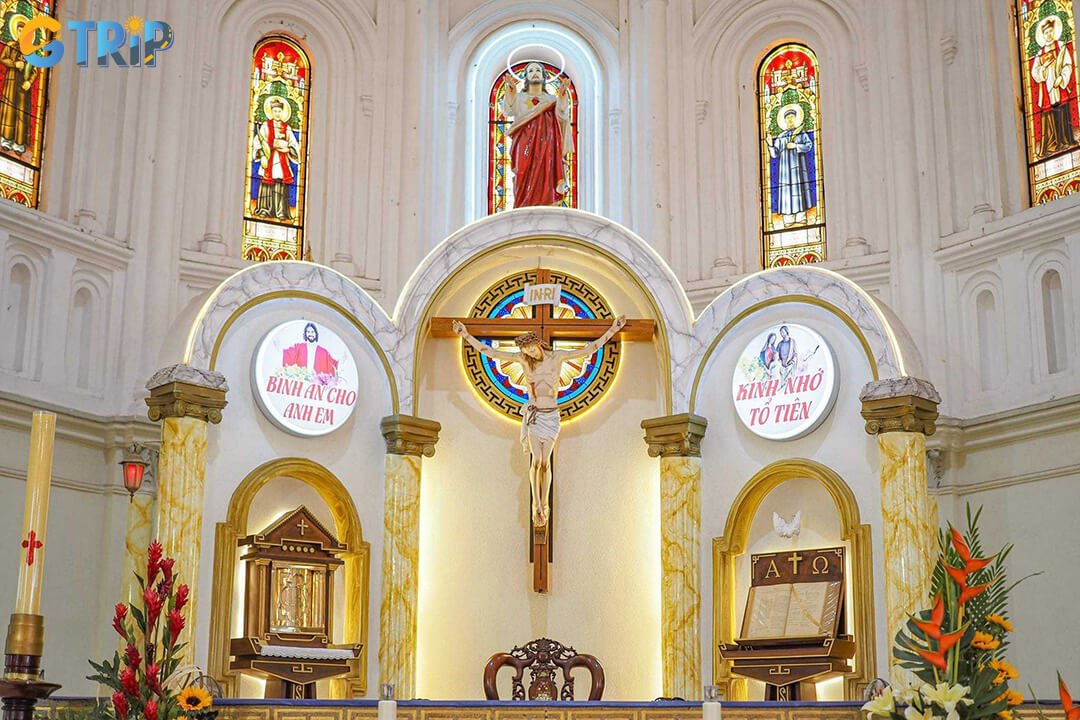 Step inside Cho Quan Church to find a serene space with soaring Gothic arches, colorful stained-glass windows