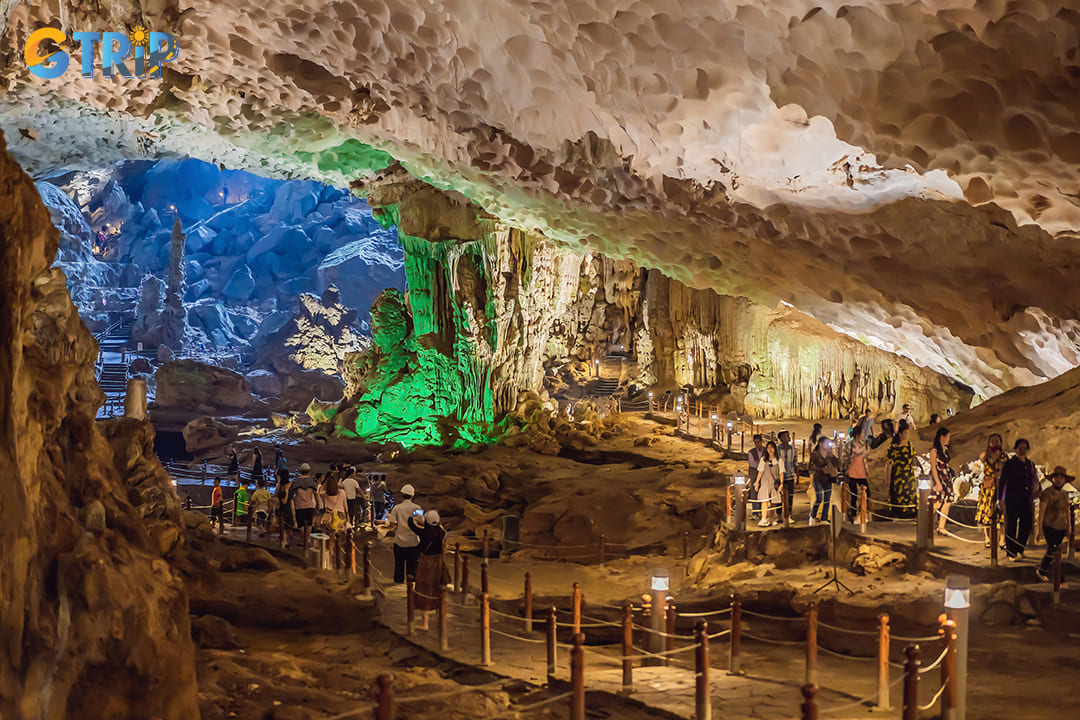 Sung Sot Cave features vast open spaces and stunning stalactites and stalagmites