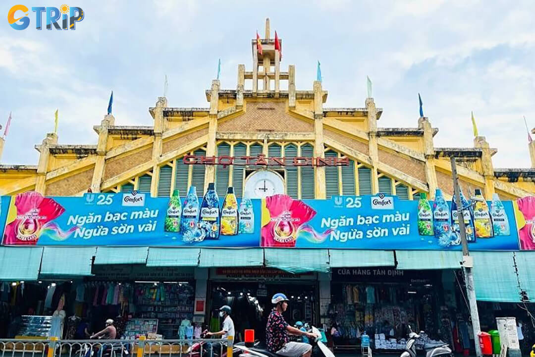 Tan Dinh Market, near the Pink Church, is a charming local hub known for fabrics, tailor-made ao dai, fresh produce, and tasty street food