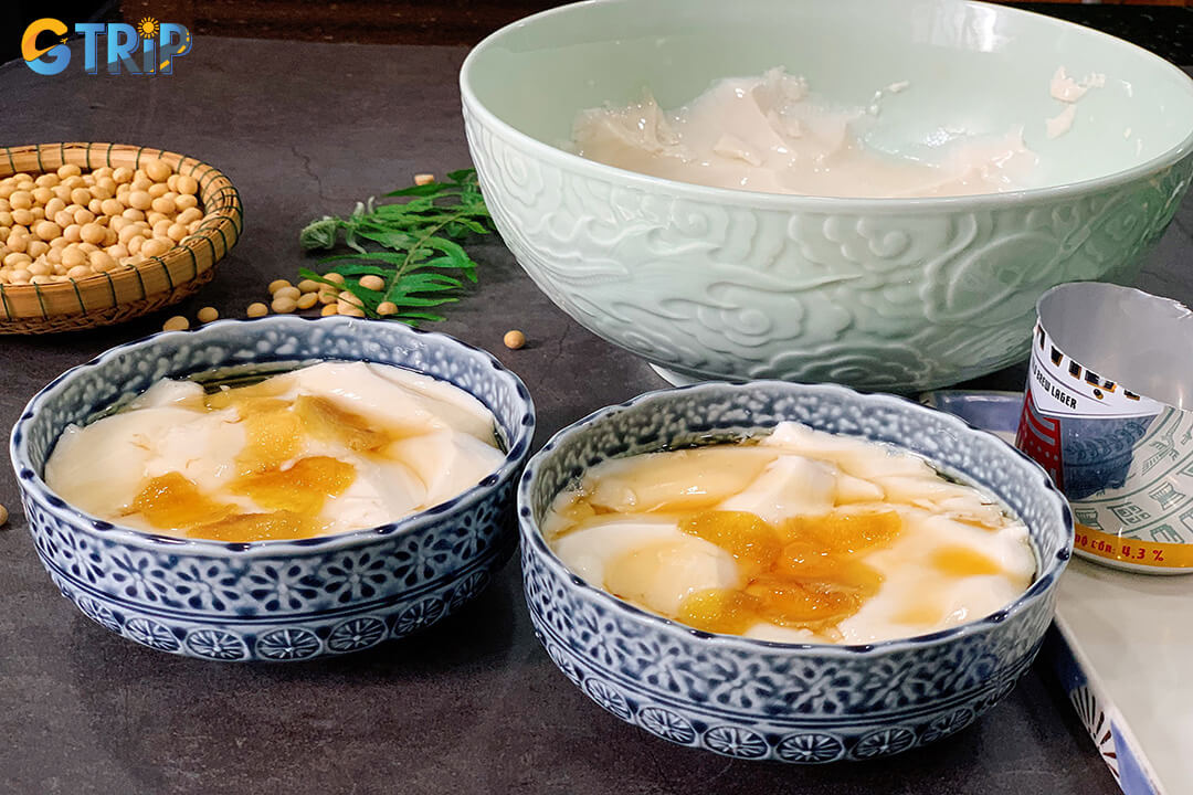 Tau hu nong is a warm Vietnamese silken tofu dessert served with sweet ginger syrup, soft, comforting, and a beloved street food treat