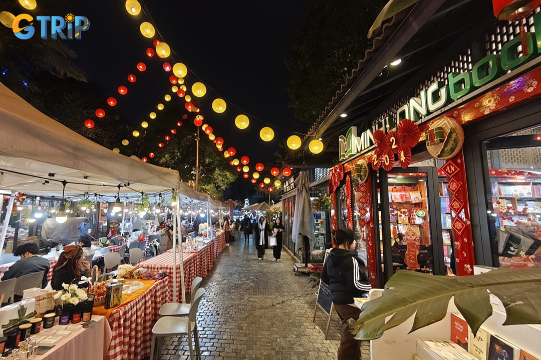 The 200-meter-long street features beautifully designed bookstores showcasing Vietnamese literature, international titles, and specialty publications