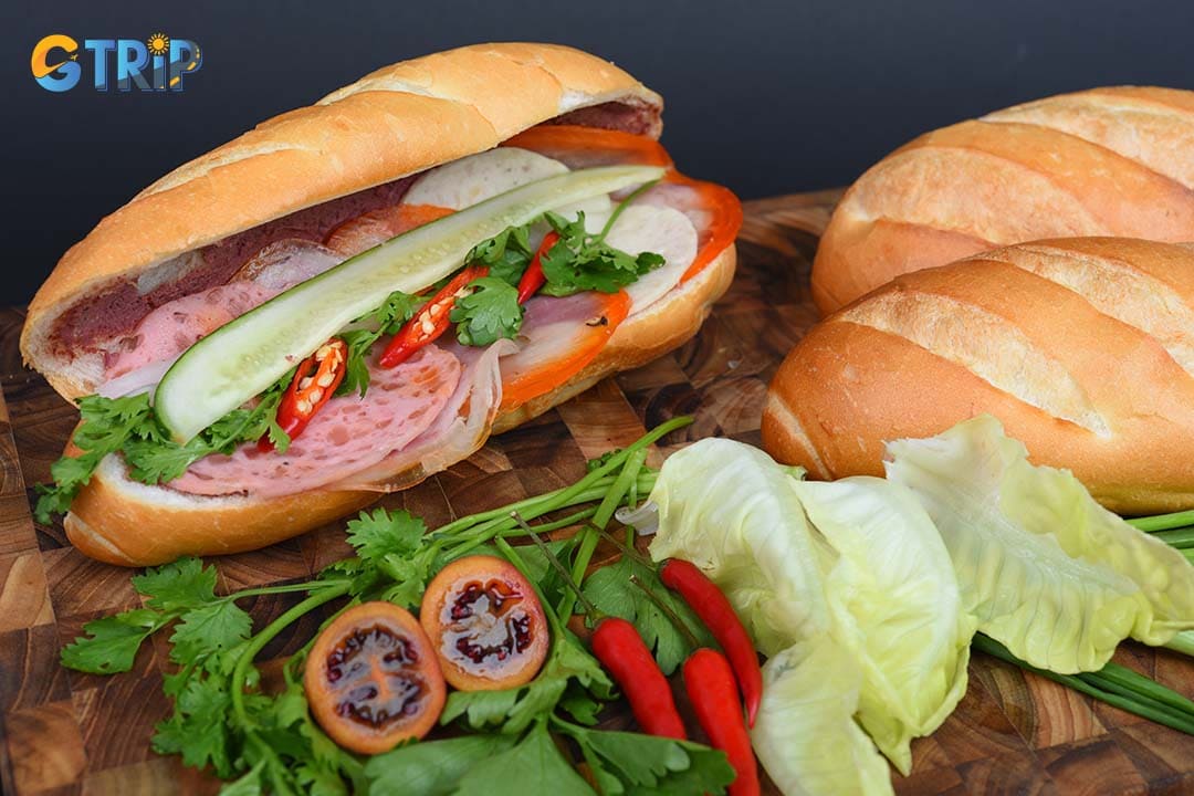 The Banh Mi thit nguoi, or special combo Banh Mi, is the classic Saigon-style sandwich featuring a medley of Vietnamese cold cuts, pate, pickled vegetables, and herbs