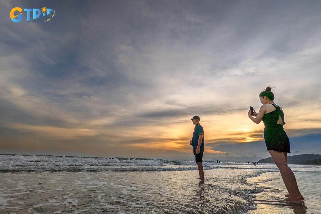 Tourist can taking sunset photos at the beach