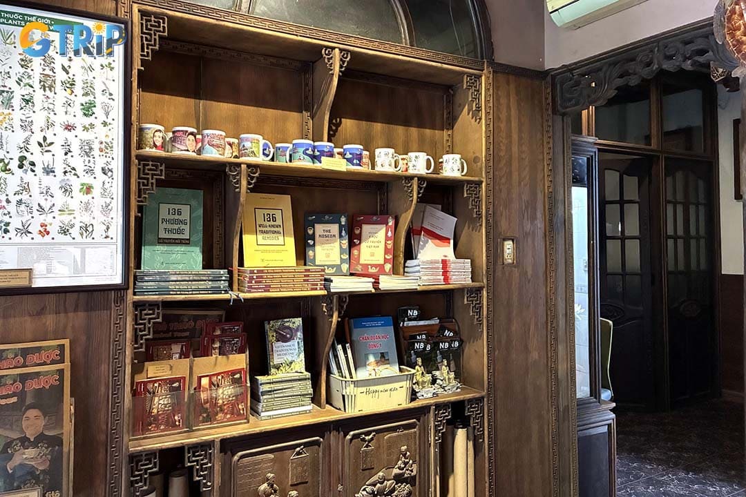 The first floor features two main areas: a cozy screening room and a charming souvenir shop