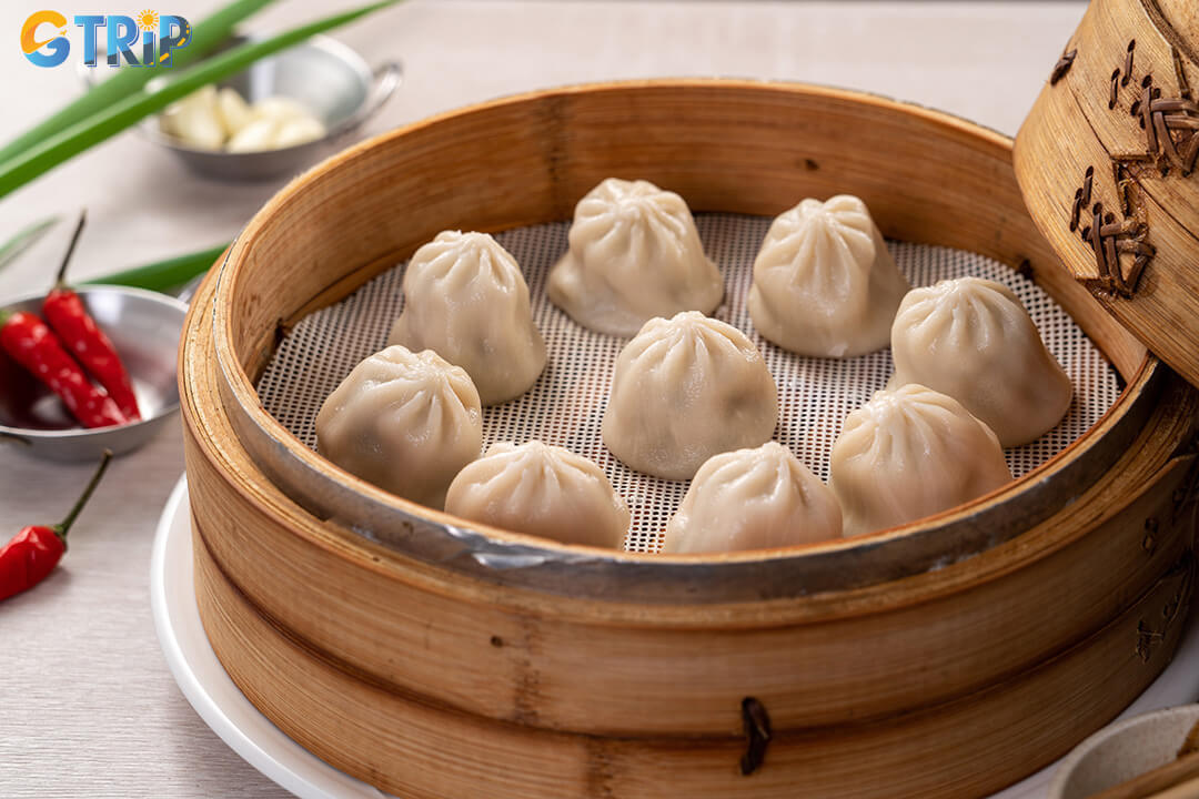 The heart of Cholon's cuisine lies in its bustling street stalls and long-standing family eateries, where iconic snacks and authentic flavors have been perfected over decades