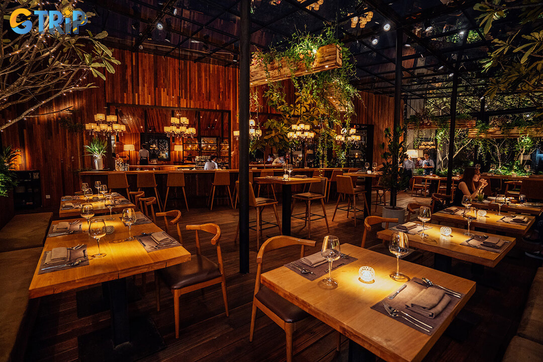 The Log Restaurant at GEM Center offers a magical treehouse dining experience with a lavish buffet, creative fusion dishes, and a romantic, greenery-filled setting